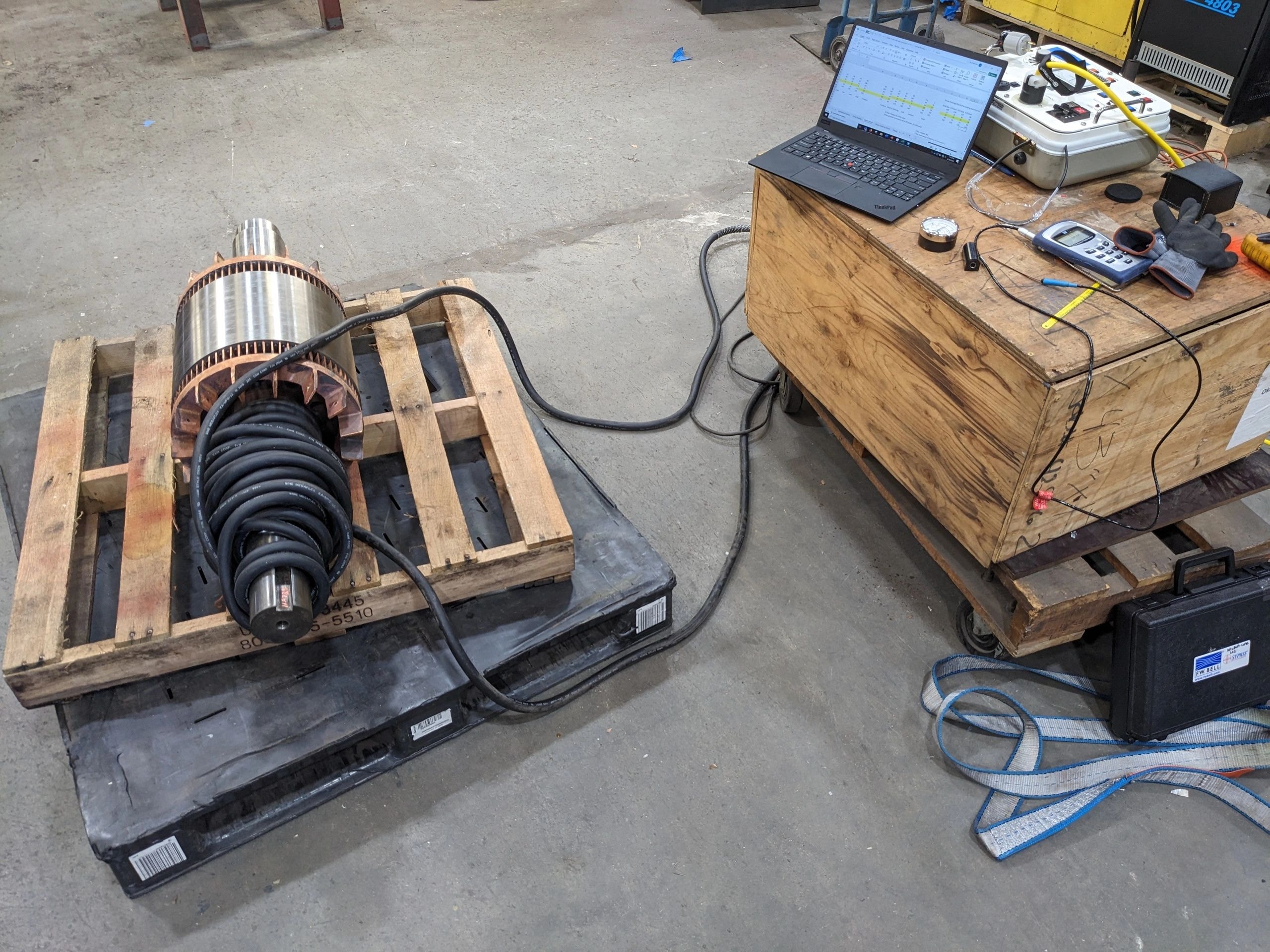 Electric motor shaft being degaussed